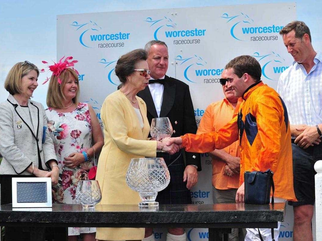 Johnathan Burke collecting his prize from Princess Anne