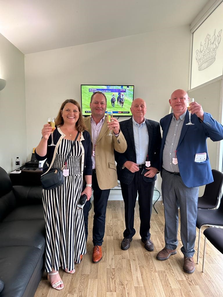 Pip, Charlie, Dave and Nick enjoying the champagne!