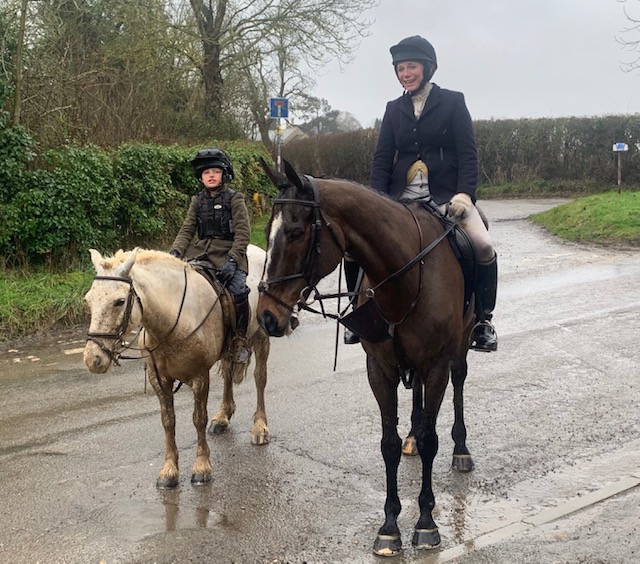 Harry and Sophie after a very wet day on their horses....
