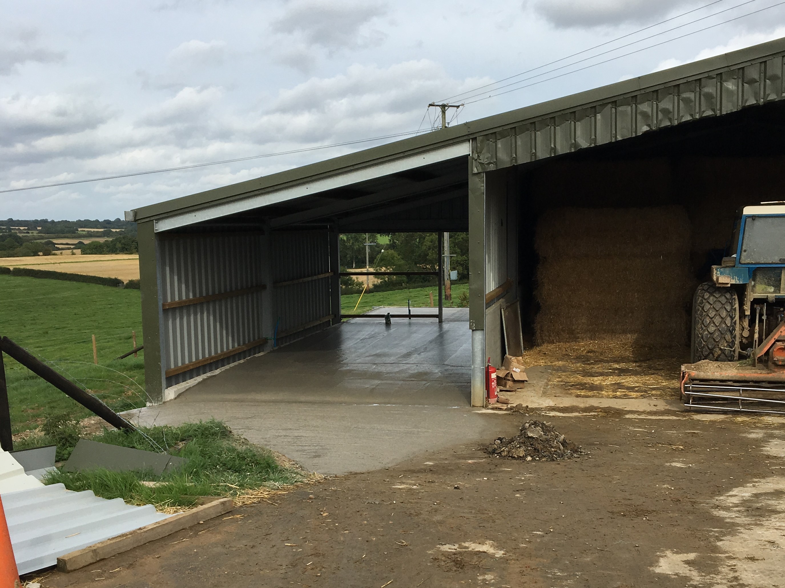 Concrete down...just waiting for the treadmill and doors