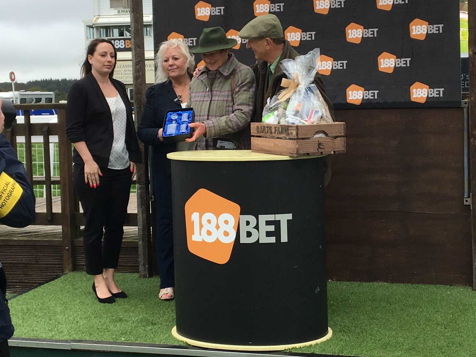 Neil & Jane Maltby collect the winning prizes at Exeter Racecourse