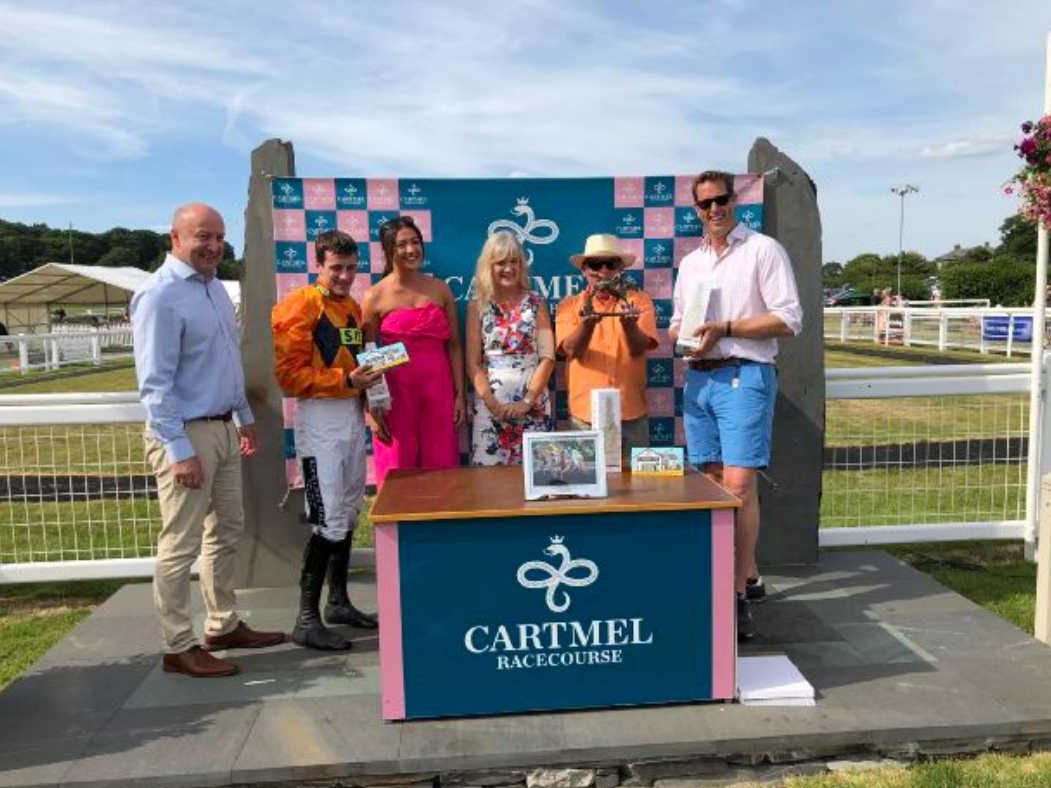 Brian Hughes, Robert Aplin and Charlie Longsdon collecting Hammersly Lake's prize at Cartmel